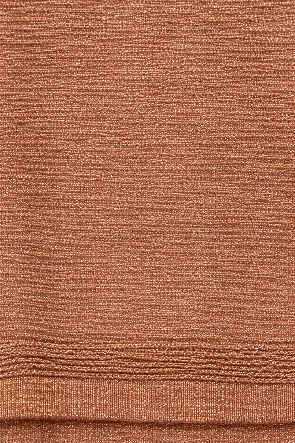 Close-up of the bronze dress fabric, showing its fine horizontal texture, metallic shimmer and hem detail.