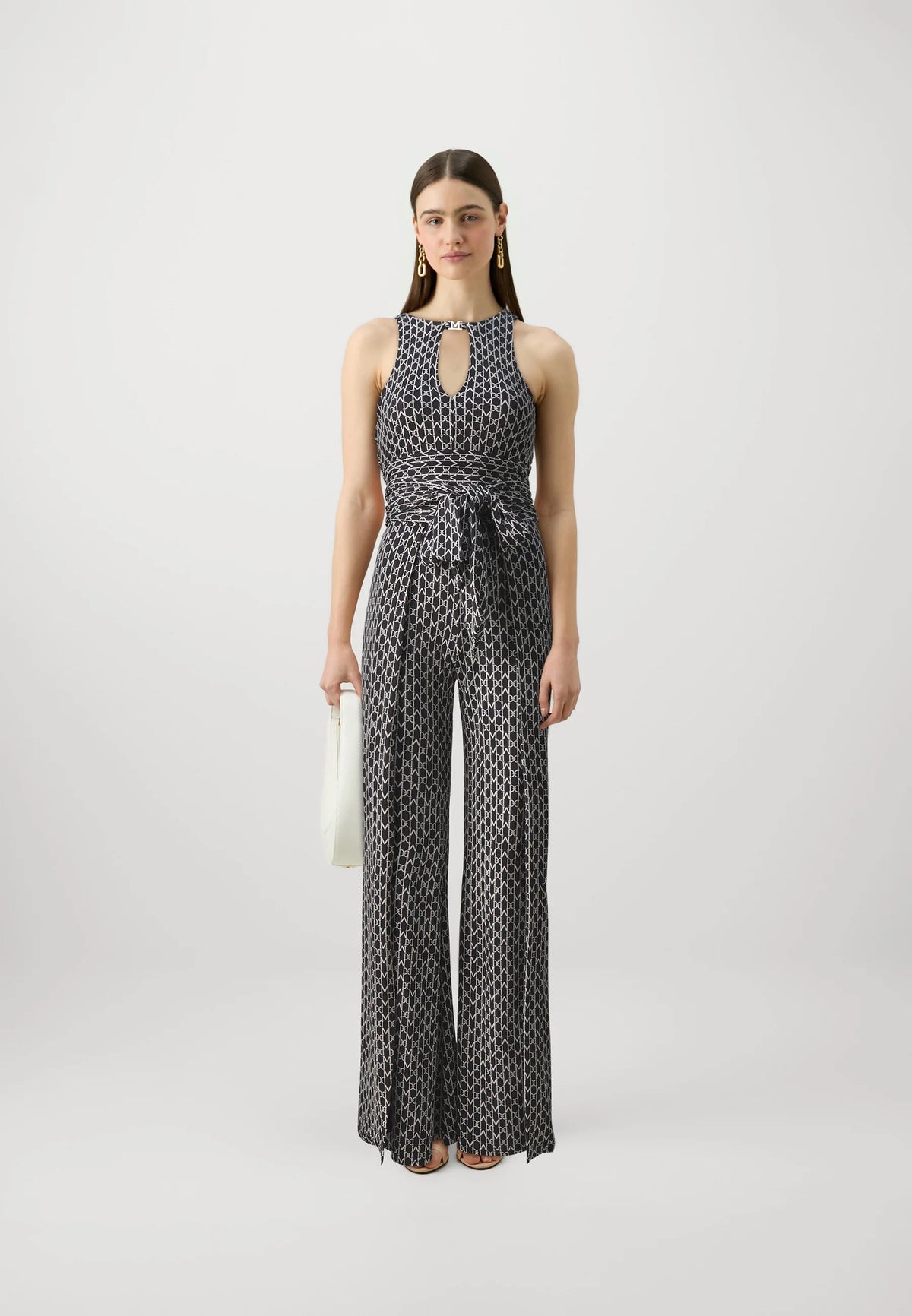 Marciano by Guess New Kiki Jumpsuit – Black in stylish patterned fabric, perfect for women's fashion and special occasions.