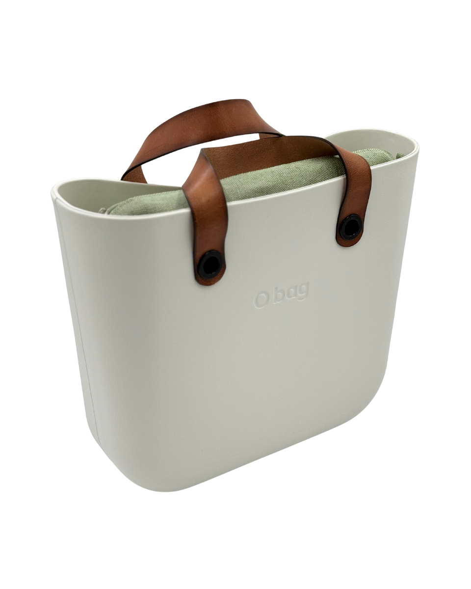 O bag – Off-White Tragetasche mit cognacfarbenen Ledergriffen & salbeigrüner Innentasche