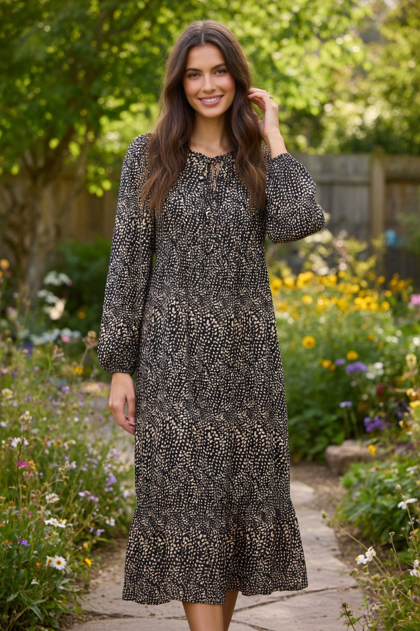 Sorbet Saphia Midikleid mit Punktmuster - Schwarz