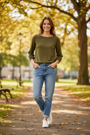 Woman wearing s.Oliver olive green top outdoors